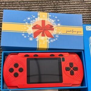 Portable Red Gaming Console.. Over 400 games